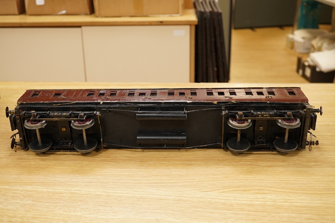 Two Gauge One bogie coaches; a Midland Railway clerestory coach, together with a 12-wheel Pullman car (bogies af), plus an American outline caboose, some scratch building and adaptation from kits, etc.